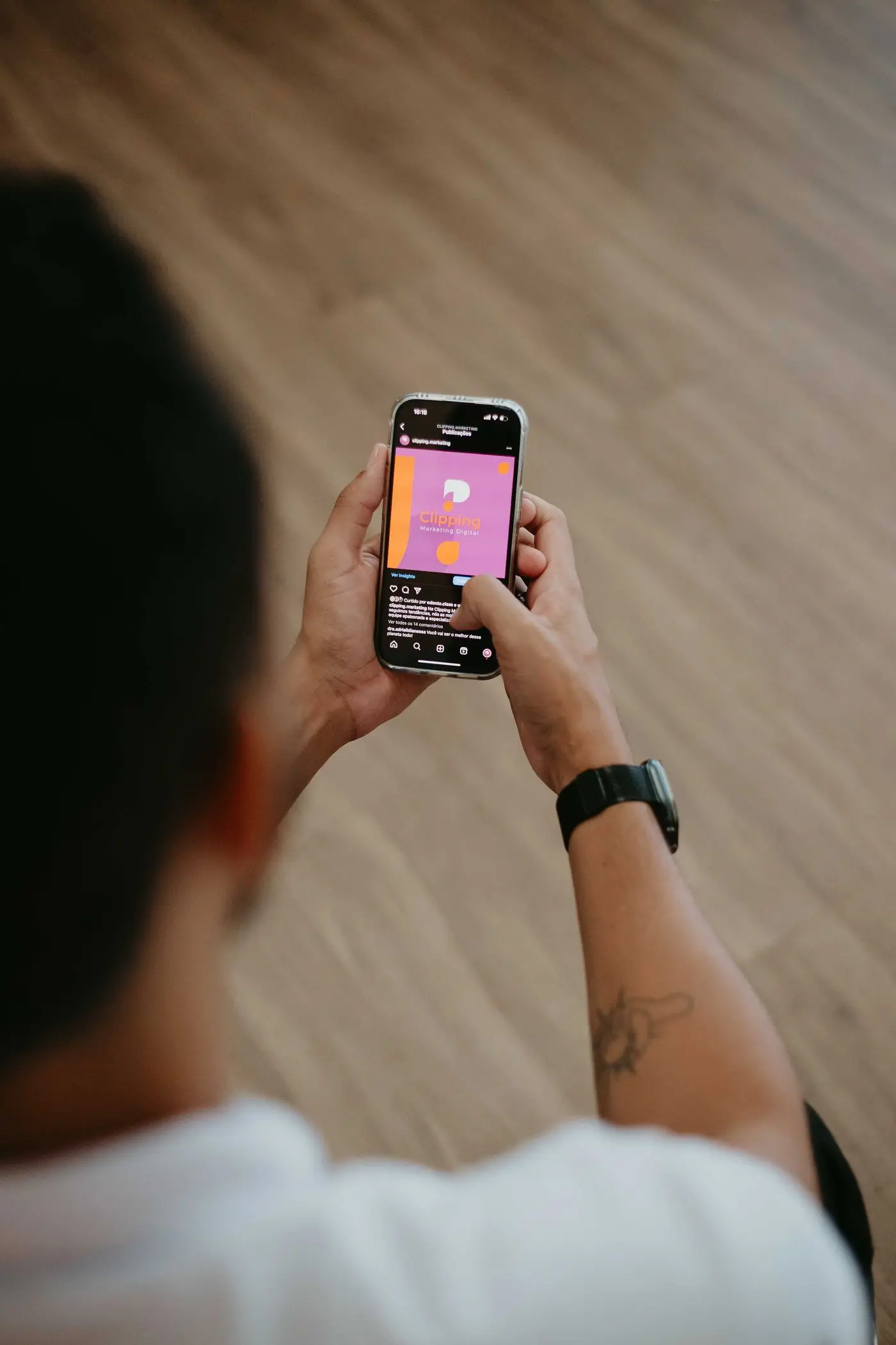 Person scrolling social media on a phone