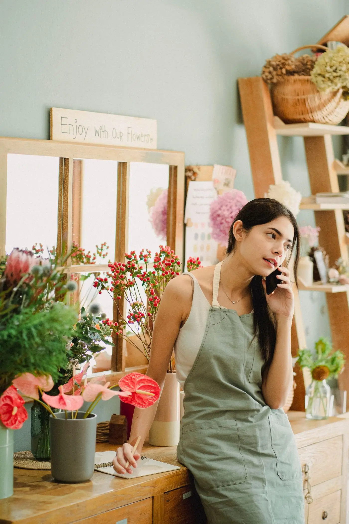 Florist shop owner taking a call