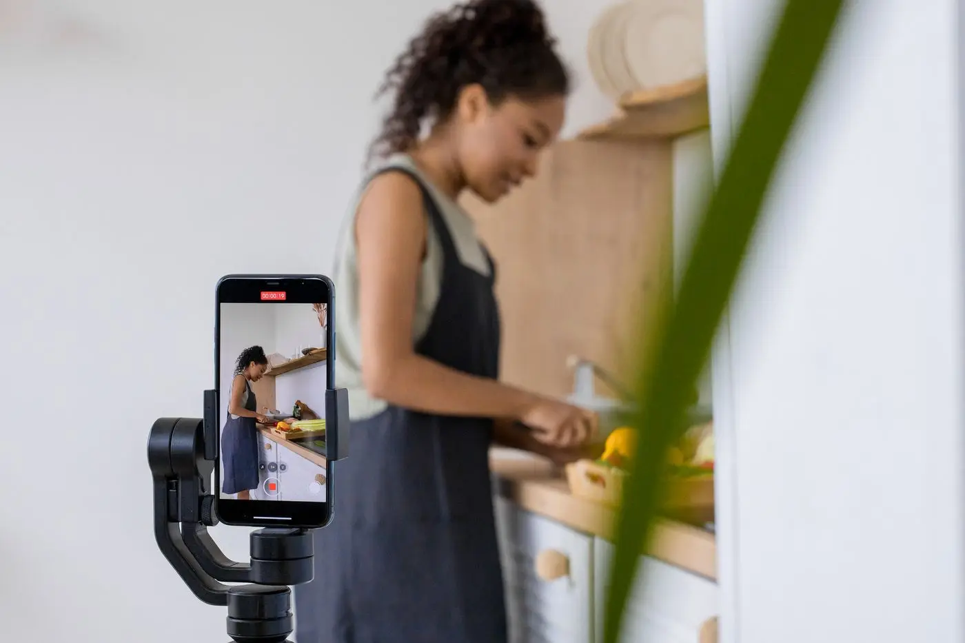 Woman filming a video with her phone
